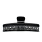 Bambi 10 Piano Black claw clip detail — Meera Studio Line, polished black finish