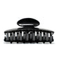Luna 9 Piano Black claw clip detail — Meera Studio Line, polished black silhouette