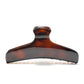 Bambi 10 Deep Amber claw clip alternate angle — premium French acetate for medium to long hair