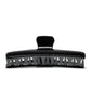 Bambi 10 Piano Black claw clip detail — Meera Studio Line, polished black finish