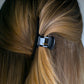Bambi 8 internal spring mechanism close-up — durable hinge detail in Piano Black