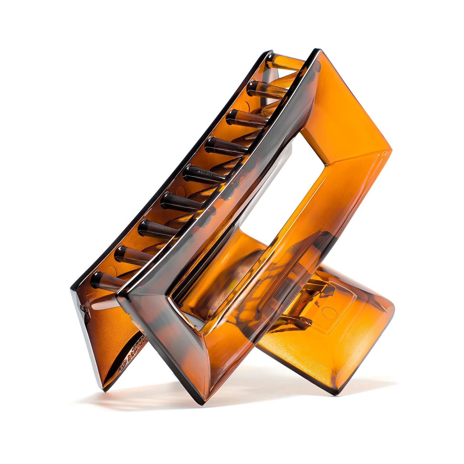 Frame 9 Deep Amber claw clip alternate angle — premium French acetate, geometric Studio Line silhouette