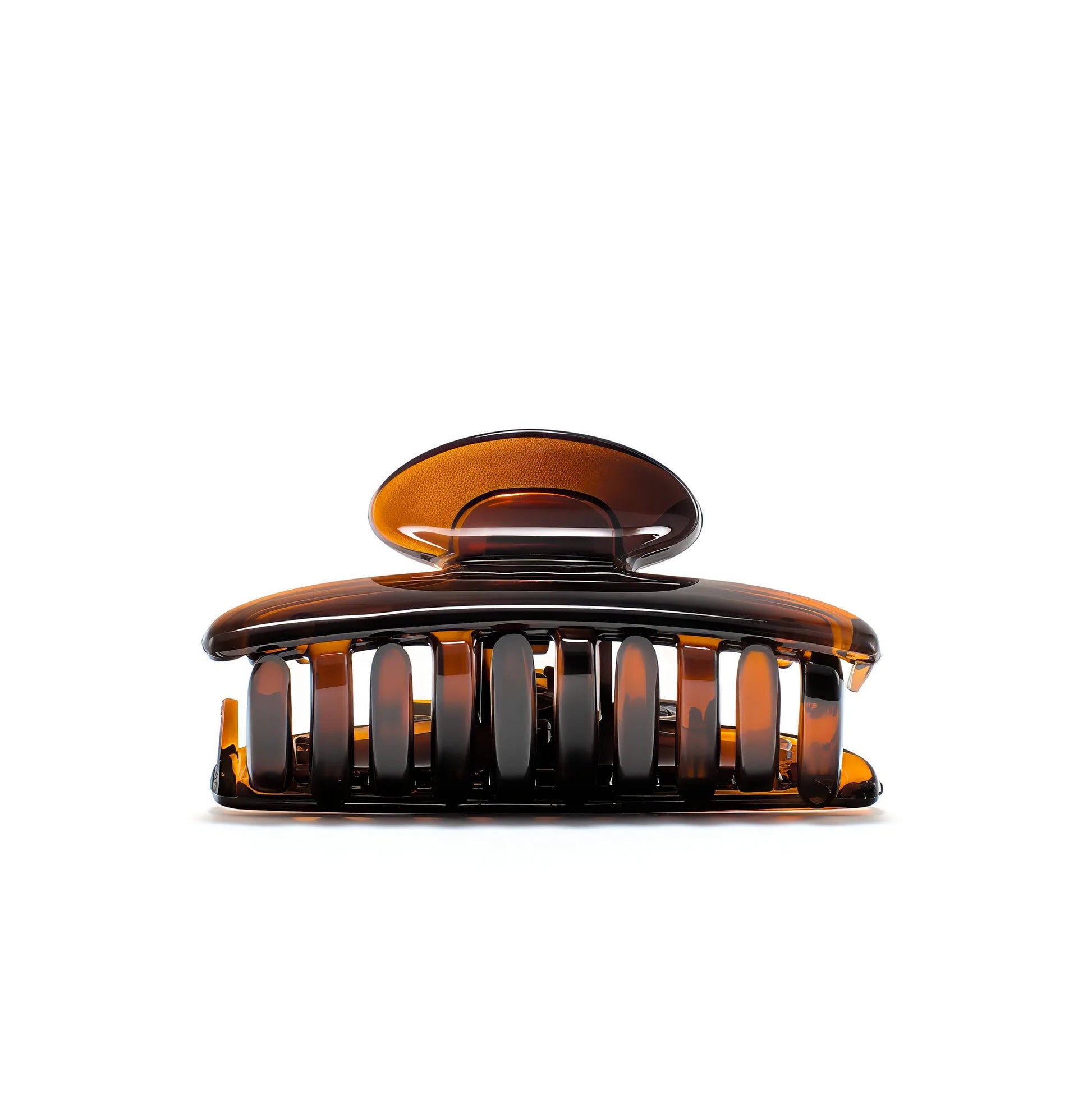 Luna 6 Deep Amber claw clip detail — Meera Studio Line, rounded tortoise silhouette