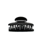Luna 6 Piano Black claw clip detail — Meera Studio Line, polished black silhouette