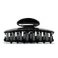 Luna 9 Piano Black claw clip detail — Meera Studio Line, polished black silhouette