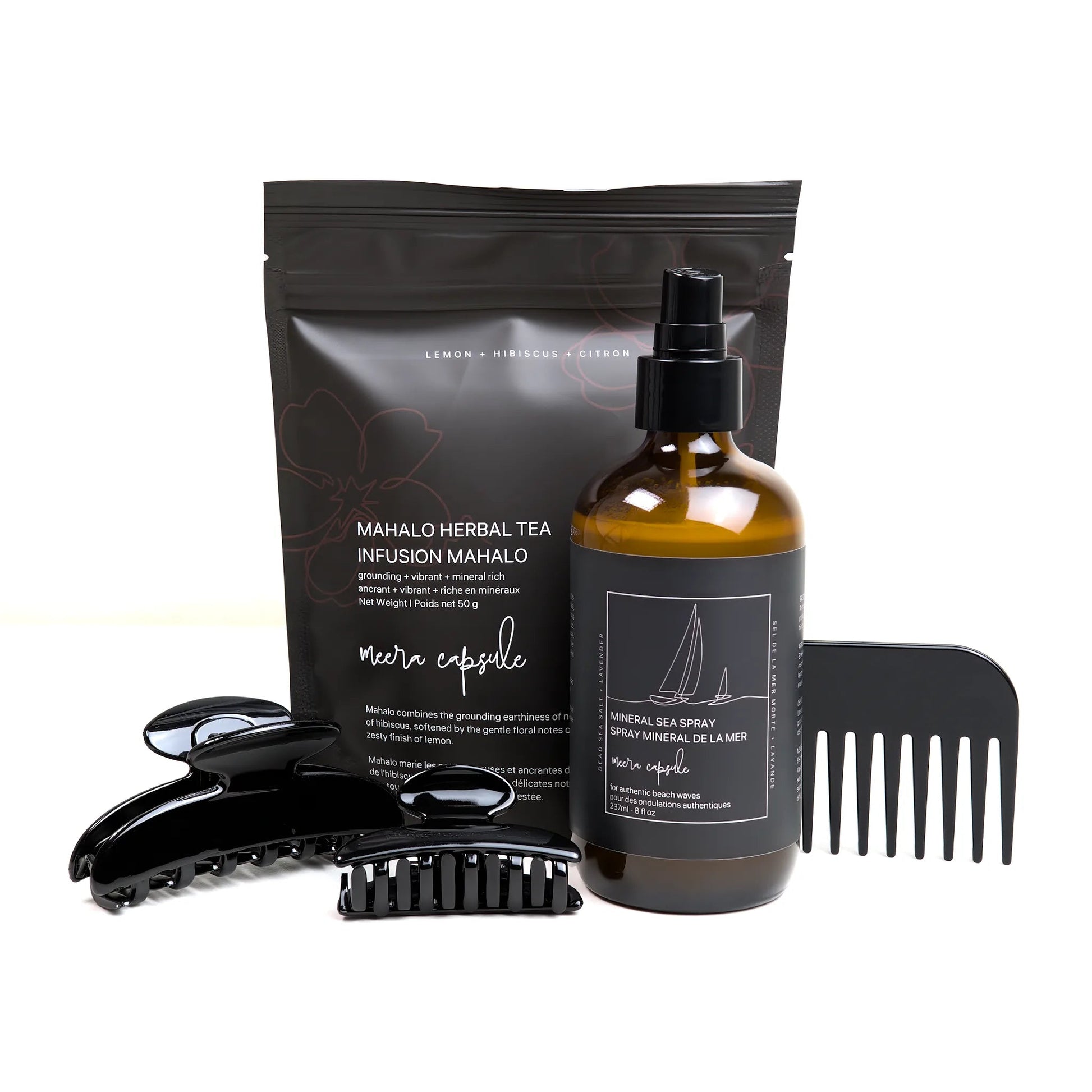 Luna Beach Capsule in Piano Black — Meera summer bundle with Luna jet-black clip, Mineral Sea Spray, and Mahalo Herbal Tea
