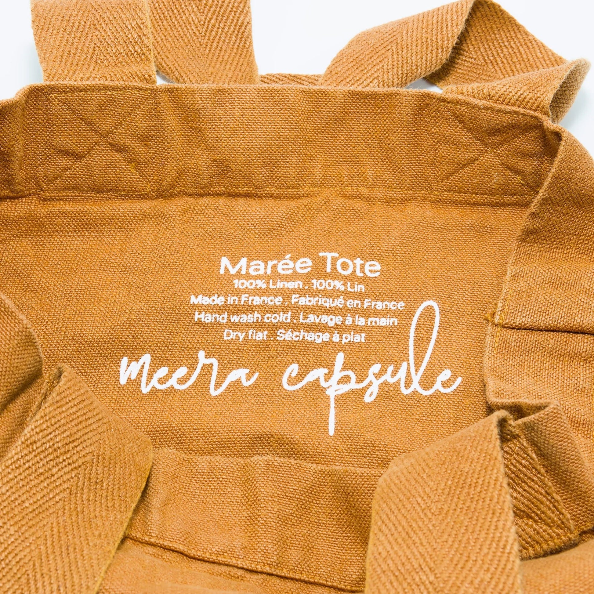 Marée Tote Clay detail — natural French linen weave with reinforced shoulder straps