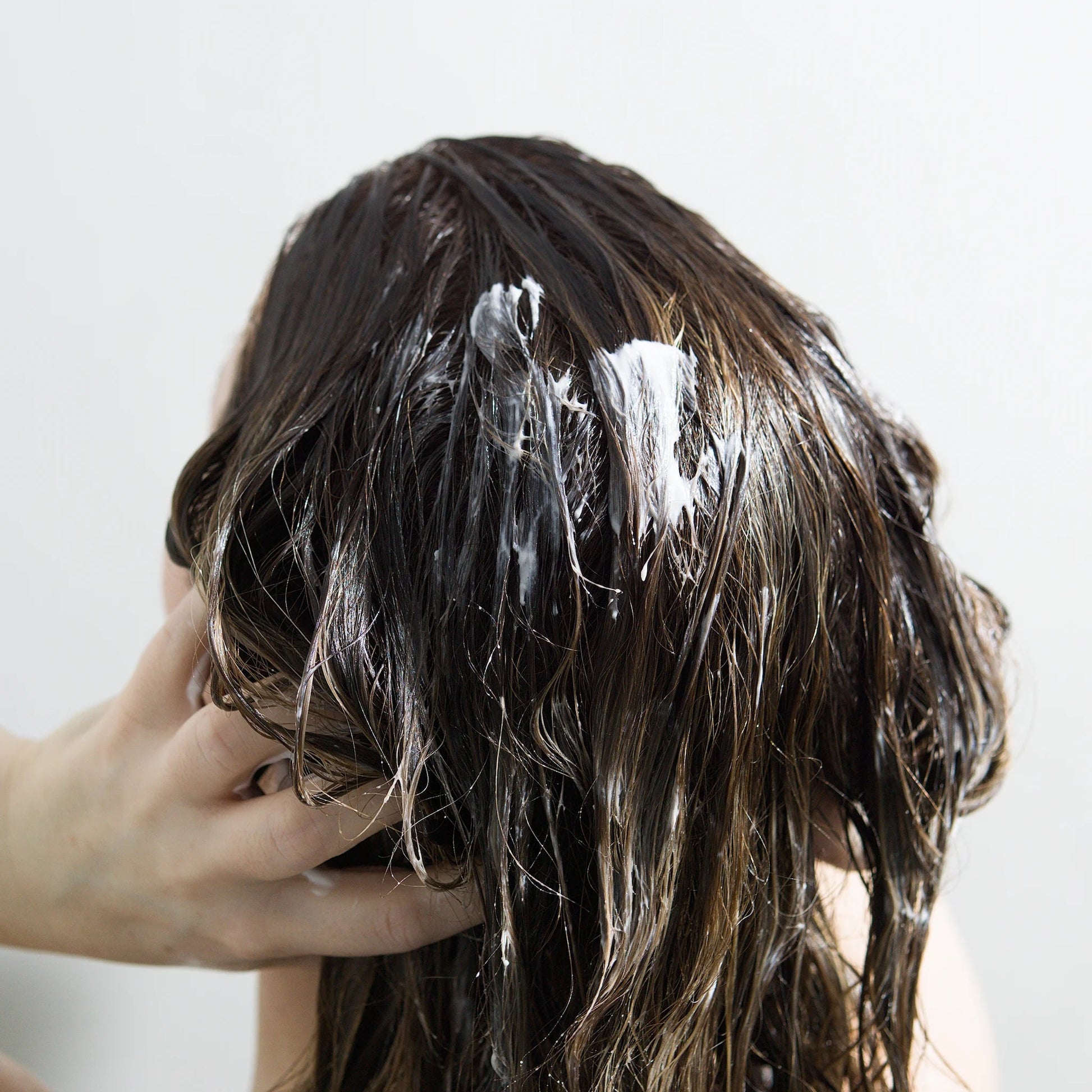 Peptide Conditioning Cream lifestyle shot — weightless conditioning without silicone