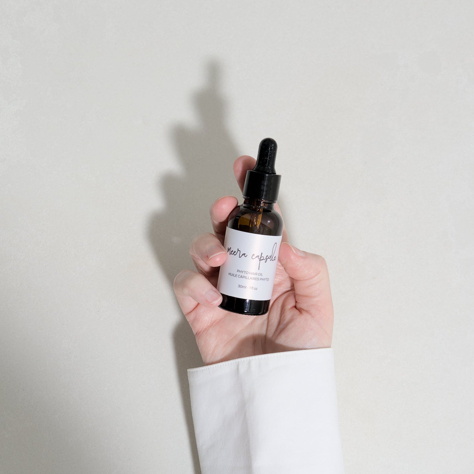 Phyto Hair Oil lifestyle shot — botanical scalp treatment with cold-pressed plant oils